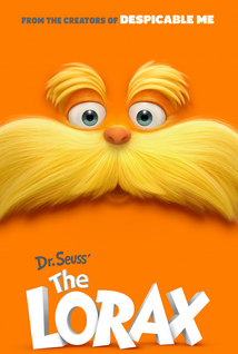 The orange face of the Lorax, with small eyes and nose between two yellow bushy eyebrows and a thick yellow mustache